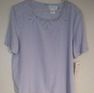 Elegant Blouse with Delicate Cutout Design